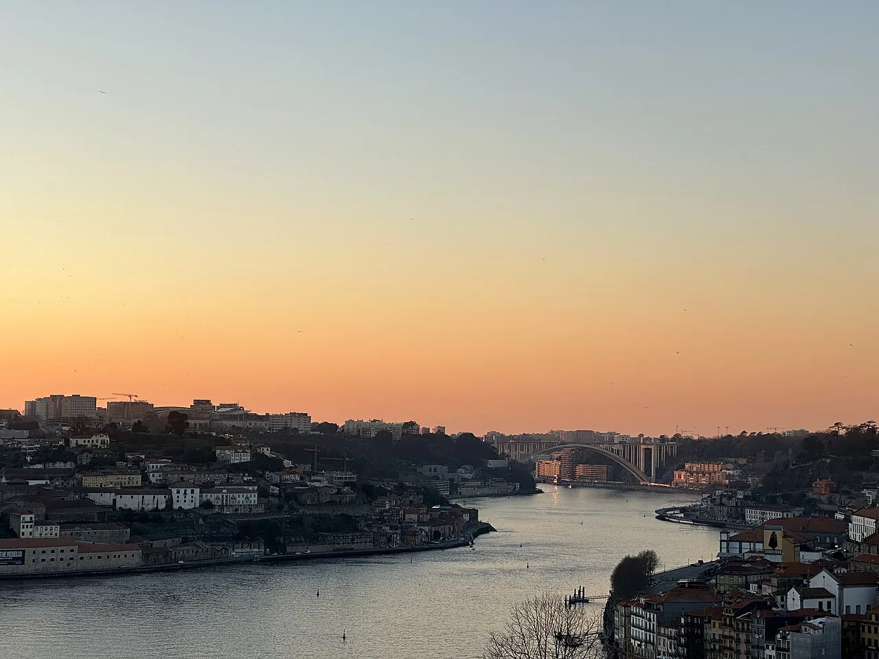 Douro River and Vila Nova de Gaia riverfront at sunset